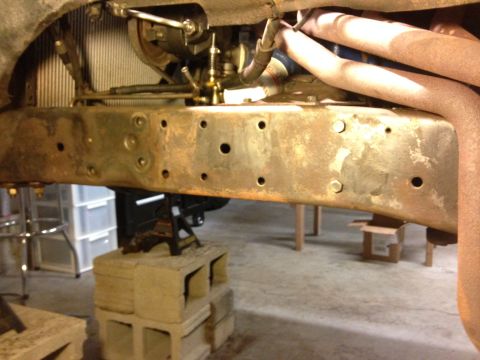 1979 Ford Bronco - This photo shows a rusted truck frame and exhaust manifold, not a 1979 Ford Bronco.