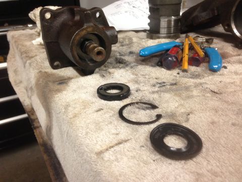 1979 Ford Bronco - Disassembled steering gear box components laid out on a towel with various tools.