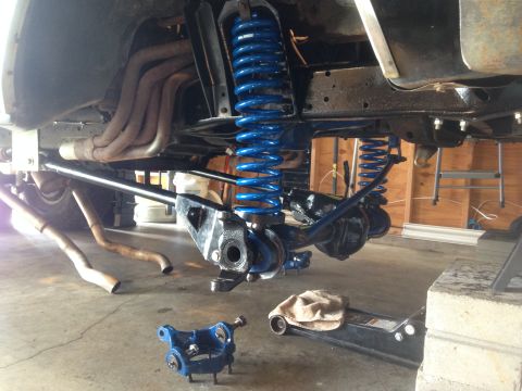1979 Ford Bronco - The underside of a 1978 Ford Bronco shows off its new bright blue suspension and exhaust system.
