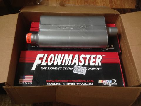 1979 Ford Bronco - New Flowmaster muffler and its packaging, ready for installation.