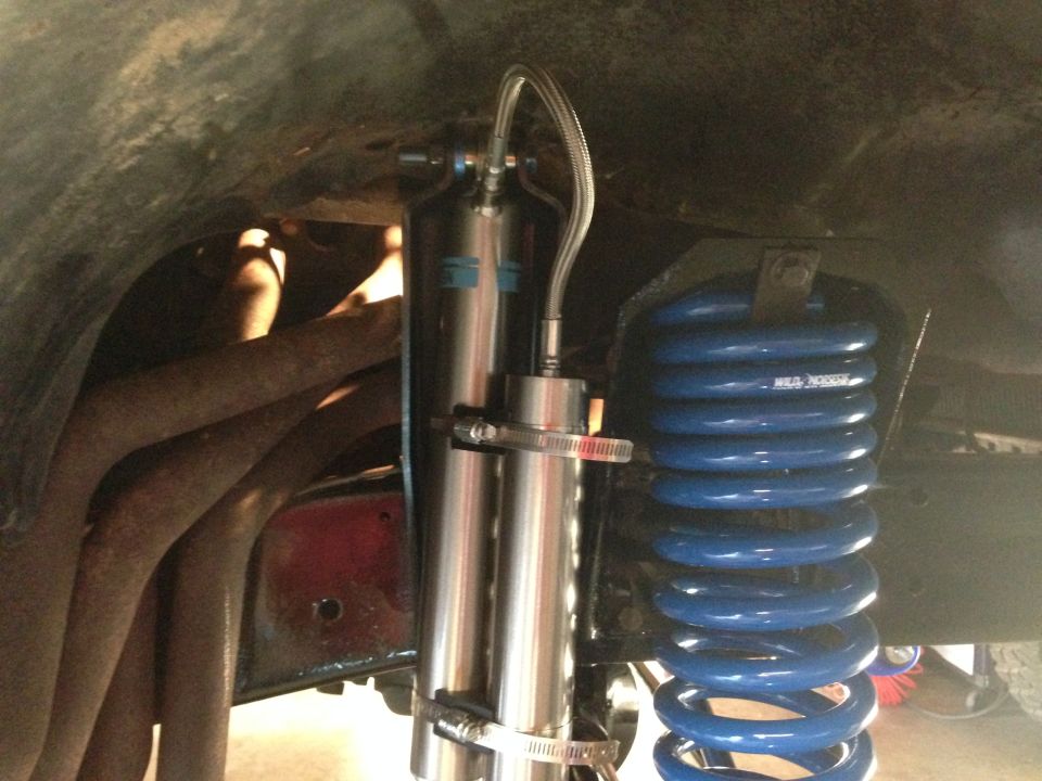Suspension part: shock absorber and blue coil spring