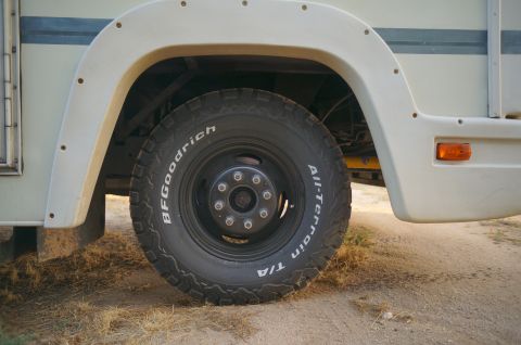 1995 Chevrolet P30 1 Ton - Step Van - The side view shows the rear wheel and fender of a large van with BFGoodrich All-Terrain tires.