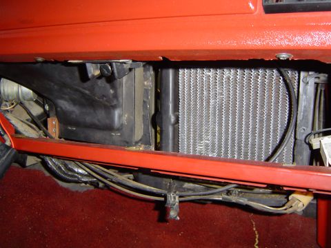 1986 Ford Bronco - Close-up of the air conditioning system components inside a vehicle's cabin.
