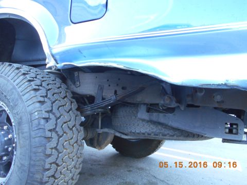 1996 Ford F-250 - Rear view of a 1996 Ford F-250 showing the suspension and spare tire.