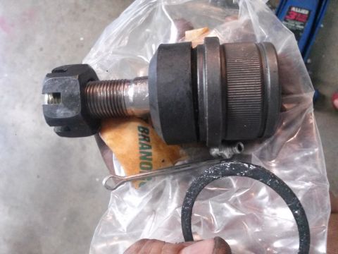 1996 Ford Bronco - A new ball joint is shown, still in its packaging with a cotter pin and nut. The registry claims it is for a 1996 Ford Bronco.
