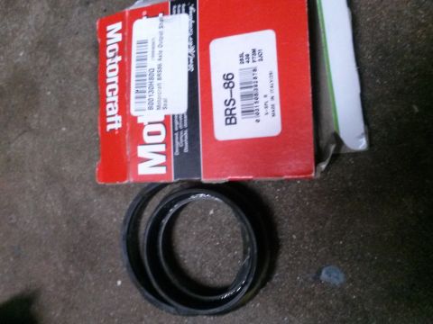 1996 Ford Bronco - Motorcraft BRS-86 seal and two rubber rings are shown on a concrete surface.