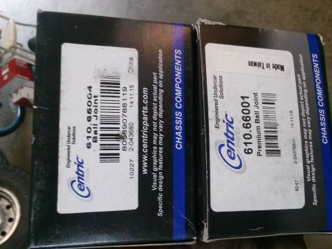 1996 Ford Bronco - Boxes of Centric ball joints are shown, with part numbers and manufacturing information visible.
