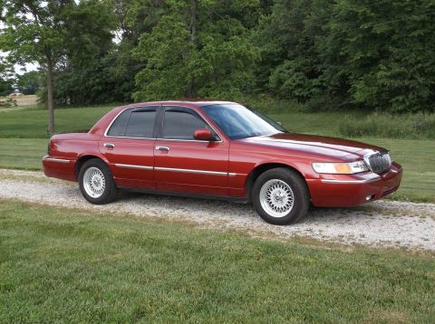 1999 Mercury Grand Marquis - This 1998 Mercury Grand Marquis is shown from the front three-quarter angle.