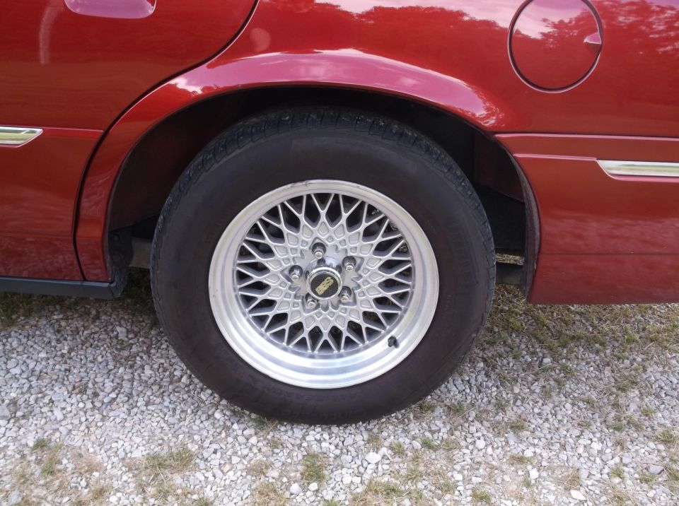 red car rear wheel with BBS mesh style rim