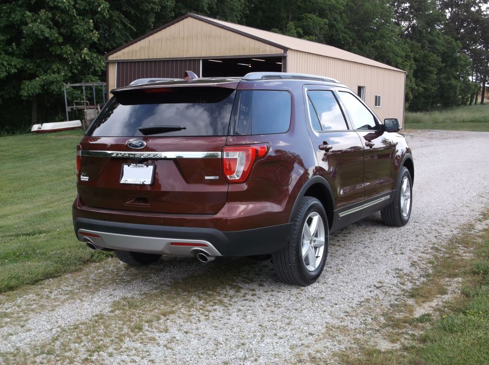 Maroon 2016 Ford Explorer rear 3/4 view