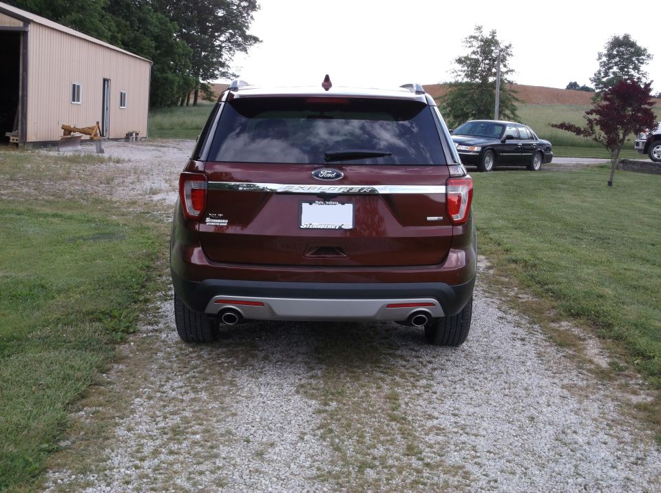 2016 Ford Explorer rear view parked on gravel driveway