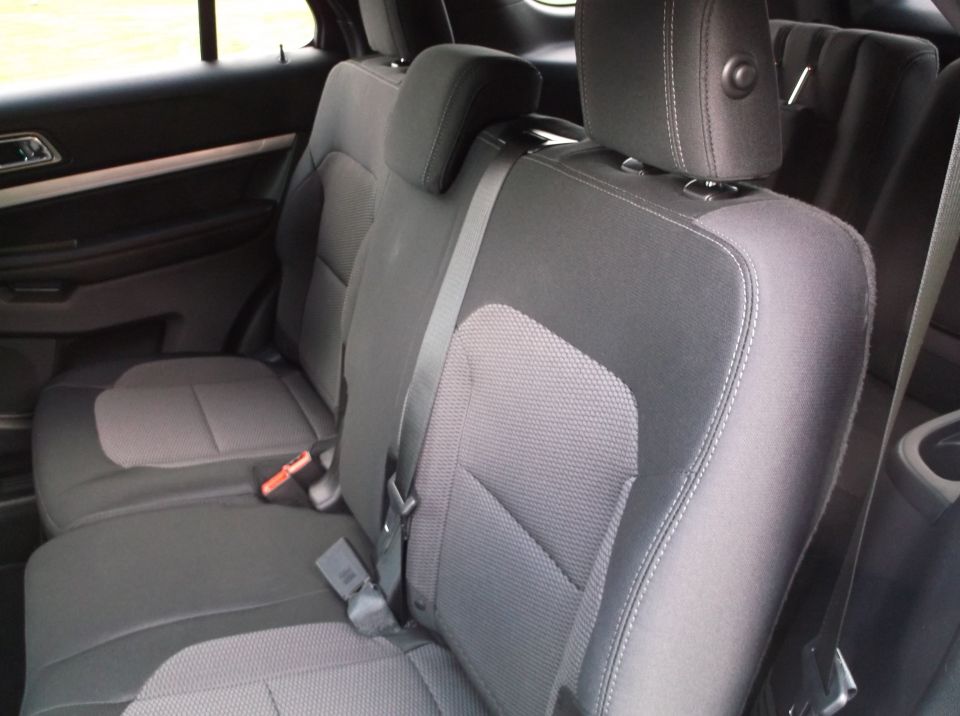 Gray fabric seats and black interior panels of a 2016 Ford Explorer