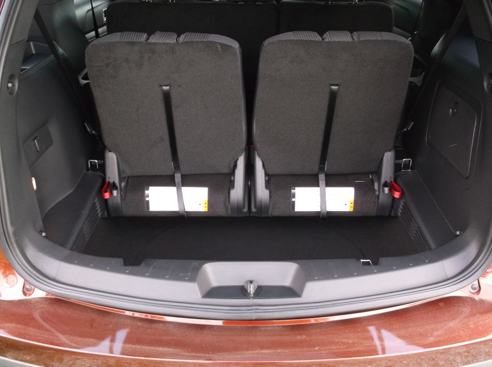 Folded third-row seats in the cargo area of a 2016 Ford Explorer