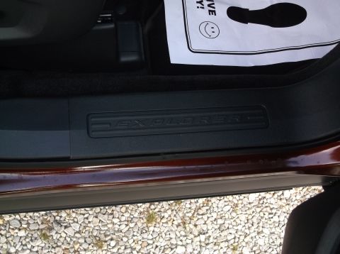 2016 Ford Explorer - Interior view of the door sill plate on a 2016 Ford Explorer.