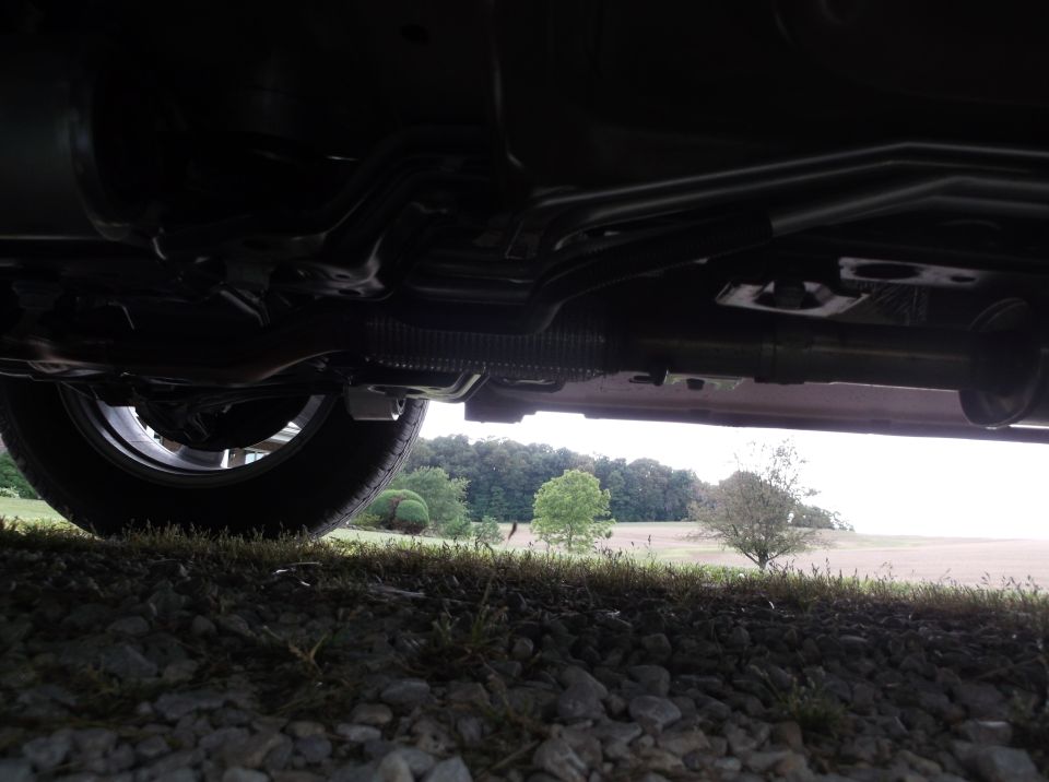 Undercarriage view showing suspension and exhaust system