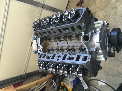 1987 Ford Bronco - This V8 engine block is partially assembled, with the intake manifold and cylinder heads visible.