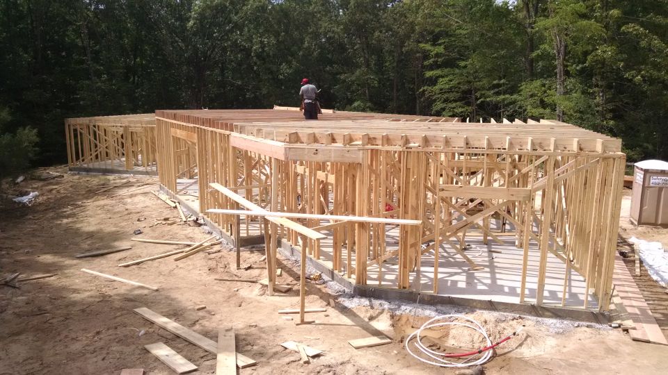 Beams & joists started going up yesterday; most of them are done today, but there are a few errors...