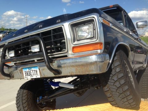 1979 Ford Bronco - This 1979 Ford Bronco features a prominent bull bar and visible aftermarket suspension components.