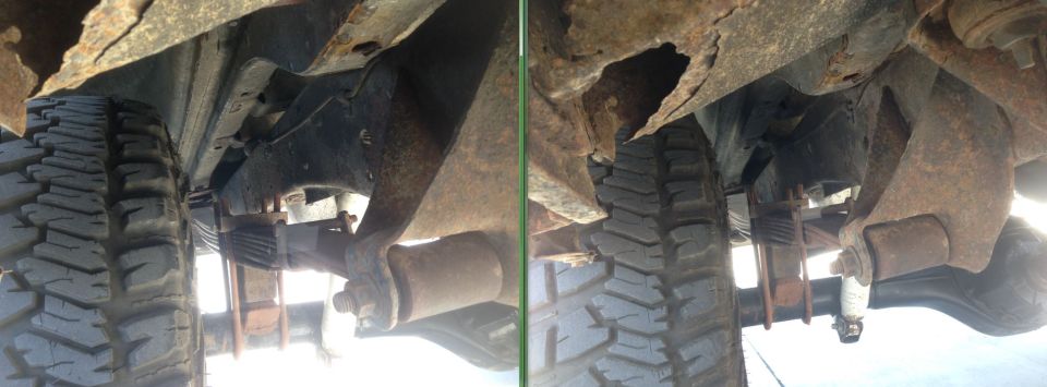 Undercarriage of two vehicles showing suspension and tires, with rust visible