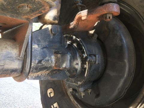 1987 Suzuki Samurai - This image shows a close-up view of a vehicle's axle and brake assembly, not a specific model year.