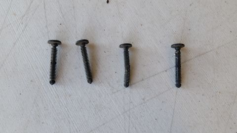 1992 Ford Bronco - There's 4 bolt plastic screws/bolts that hold this stripping in.. The top of the stripping is held on by a track. Coming down the sides are…