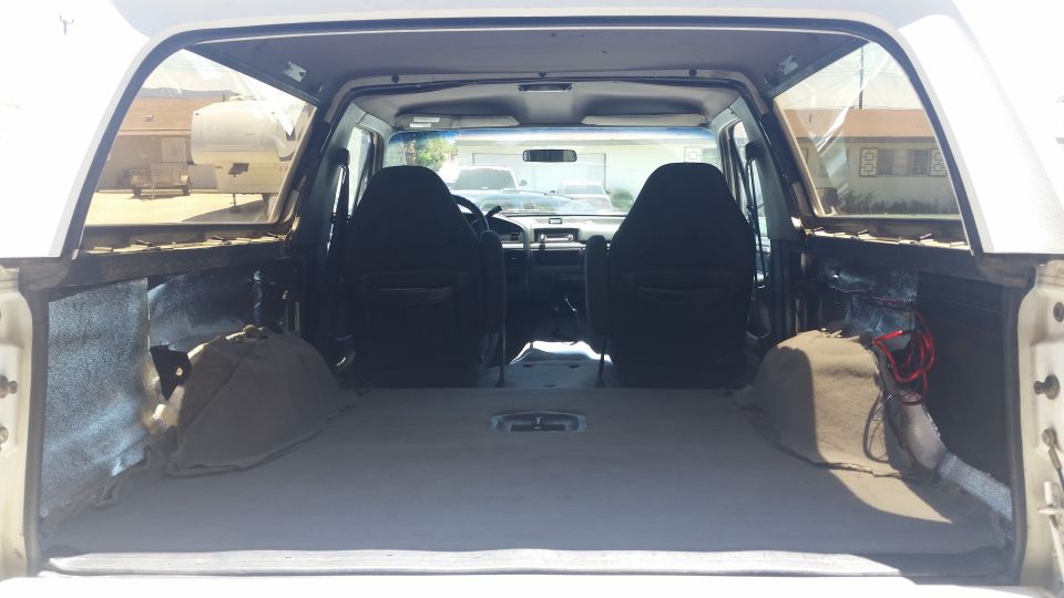 1992 Ford Bronco interior, rear cargo area empty, front seats visible
