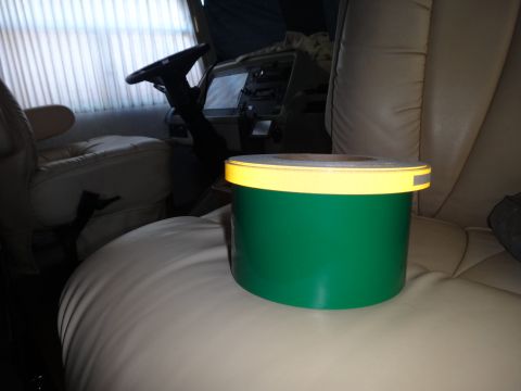 1995 Chevrolet P30 1 Ton - Step Van - Interior view of a vehicle, seats, steering wheel, dashboard, and a green bucket.