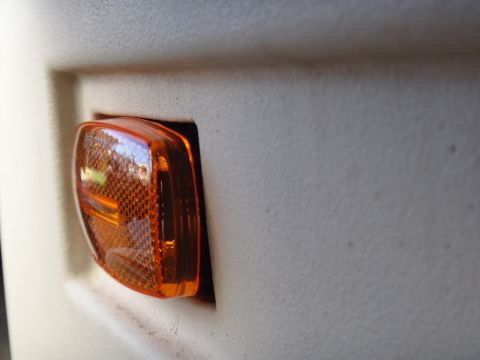 1995 Chevrolet P30 1 Ton - Step Van - An orange marker light is visible on the interior panel of a vehicle.