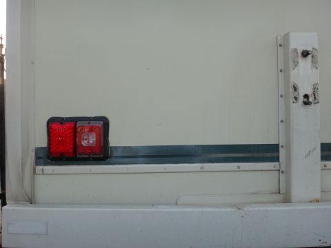 1995 Chevrolet P30 1 Ton - Step Van - Rear view of a step van showing its tail lights and a structural support.