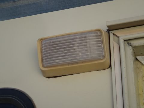 1995 Chevrolet P30 1 Ton - Step Van - Close-up of a rectangular side marker light assembly on a vehicle's exterior.