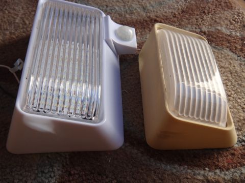1995 Chevrolet P30 1 Ton - Step Van - A comparison of two vehicle lights, one modern LED and one older yellowed plastic unit.