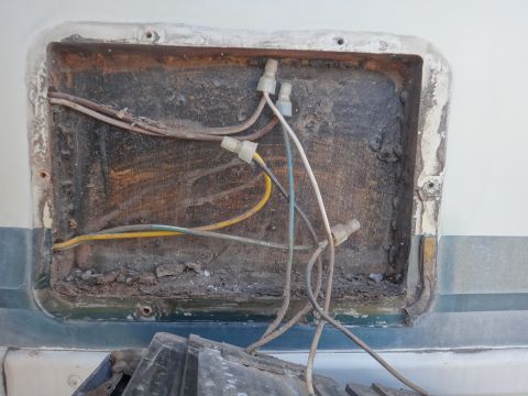 1995 Chevrolet P30 1 Ton - Step Van - This photo shows exposed wiring and connectors within a recessed compartment, not a vehicle.