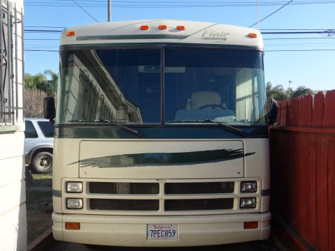 1995 Chevrolet P30 1 Ton - Step Van - This Flair RV motorhome has a distinctive front grille and dual headlights.