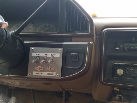 1988 Ford Bronco - Aftermarket switches and a JVC stereo are installed on the vehicle's dashboard.