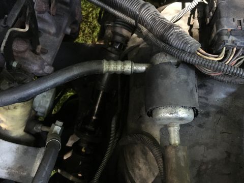 1993 Ford Bronco - Tried to install stock airbox however it doesn't fit this thing is in the way. Is it supposed to be there? What is it? Where should I move…