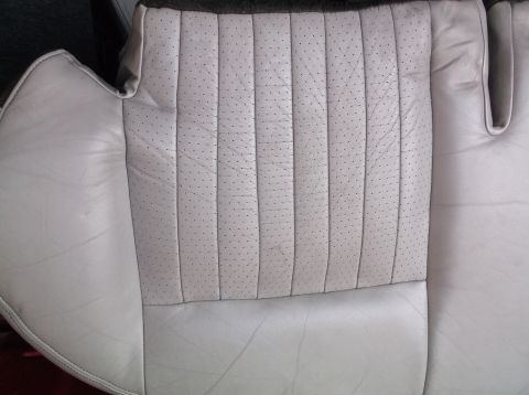 1999 Mercury Grand Marquis - Perforated leather seat upholstery with vertical stitching detail.