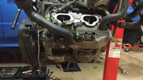 2007 Subaru Impreza - Engine assembly on a stand with tools nearby, ready for work.
