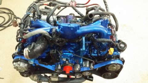 2007 Subaru Impreza - A custom blue Subaru EJ25 engine is shown, likely modified for performance.