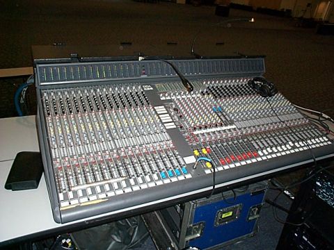 1994 Ford Bronco - This audio mixing console has numerous channels and controls for sound engineering.