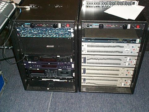 1994 Ford Bronco - Two racks filled with audio processing gear, likely for sound production or live events.