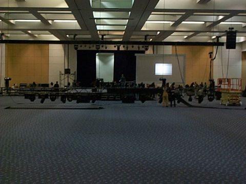 1994 Ford Bronco - Conference room setup with stage lighting rig and projector screen.