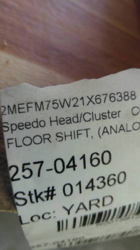 2001 Mercury Grand Marquis - A label with part information and stock number is shown, indicating it's for a speedo head/cluster.