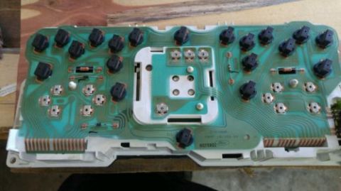 2001 Mercury Grand Marquis - A dashboard circuit board is shown with various electrical components and connectors.