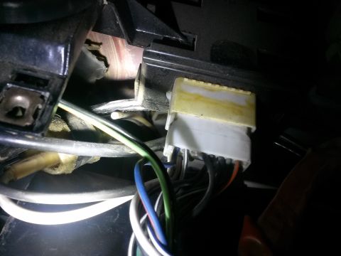 1996 Ford Bronco - This image shows a close-up view of a vehicle's wiring harness connector, likely related to the A/C system.