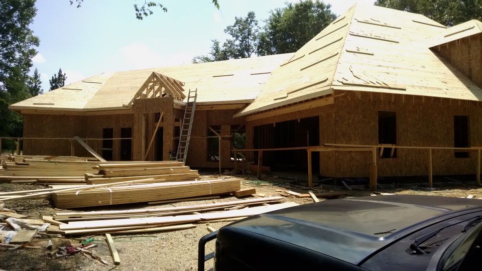 The front porch roof isn't right yet, but the framer will fix it Monday.