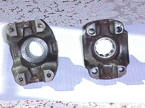 1984 Jeep Wrangler - Two driveshaft yokes are shown, likely for a Jeep Wrangler, with visible splines.