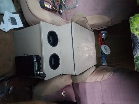 1988 Ford Bronco - Custom speaker box and Cobra CB radio installed in the interior of a vehicle.