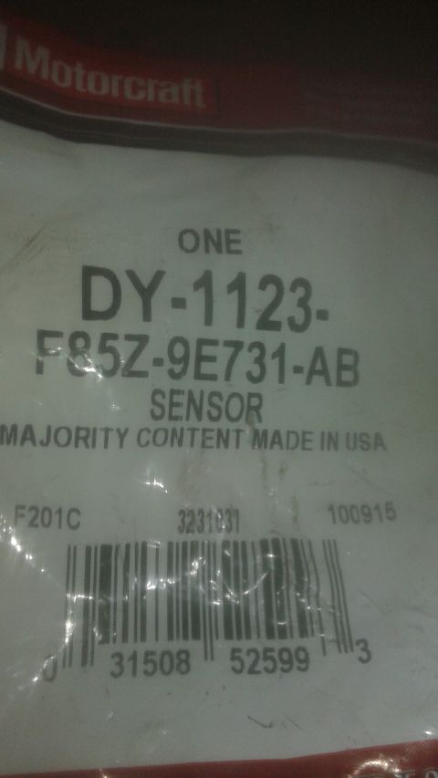 1996 Ford Bronco - Packaging for a Motorcraft DY-1123 sensor, made in the USA, with a barcode and part number F85Z-9E731-AB.