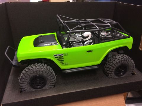 1989 Ford Bronco - This is a remote-controlled crawler with a roll cage and off-road tires.