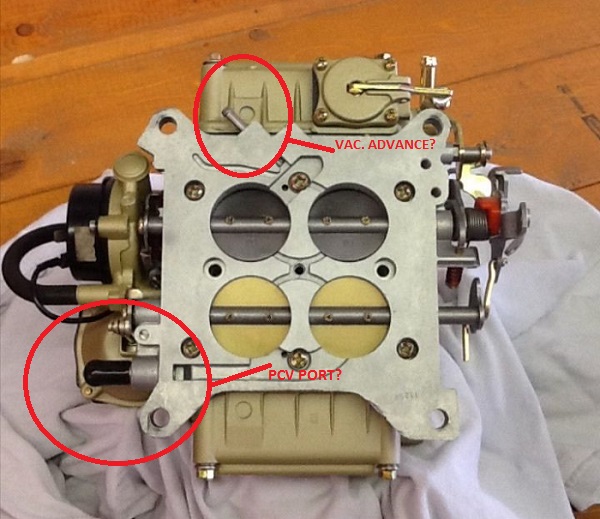 Carburetor with vacuum advance and PCV ports circled